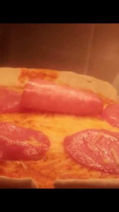 perpetual pepperoni: spins constantly when put on pizza