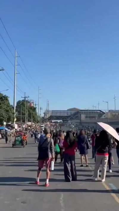 Huge crowds spotted on the streets in the Philippines after oil shortages trigger a national energy emergency