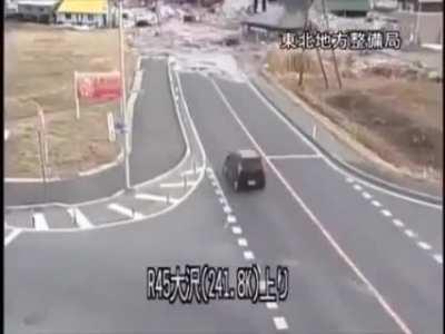 The catastrophic destruction a Tsunami caused by the Tohoku earthquake in 2011