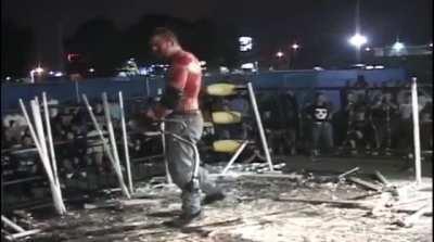 Deathmatch wrestler takes weed whacker to opponents torso and cuts it to shreds