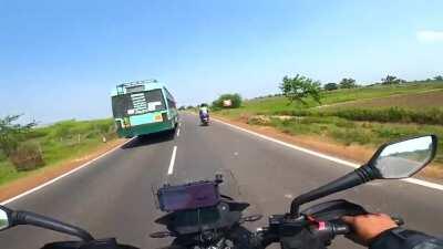 Trafic police stops a motorcyclist to ask him if he could deliver the medicin that was accidentally dropped by an old women.