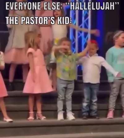 “Hey Mom, I told you I didn’t want to be on this stupid stage!”