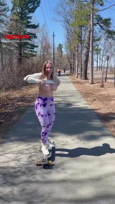 Showing off my big tits while long boarding