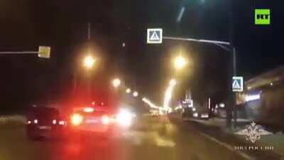 [RUSSIA] Cops in car deflect idiot from hitting a pedestrian