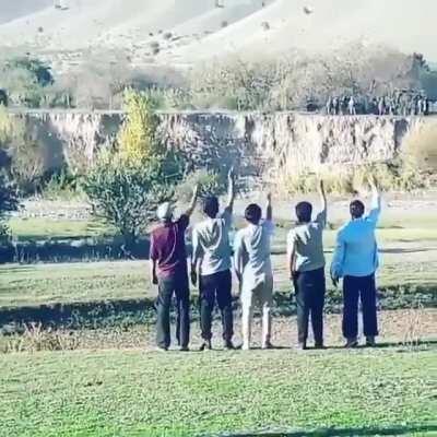 Southern Azerbaijanis sing and salute the Azerbaijani soldiers across the border.
