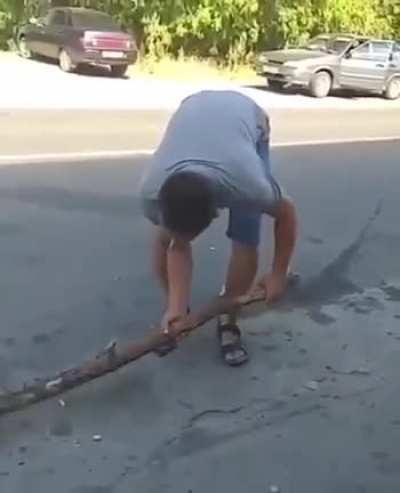 Dude walks up and KO's another dude with a stick