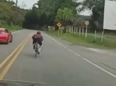 A Porsche 911 hits a Hyundai Santa Fe. Luckily, the Porsche driver was able to manoeuvre his wrecked car to also take out a cyclist.