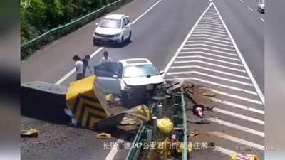 Driver hits guard rail end section and goes vertical
