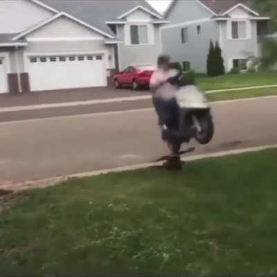 WCGW Trying to hit a jump on a moped
