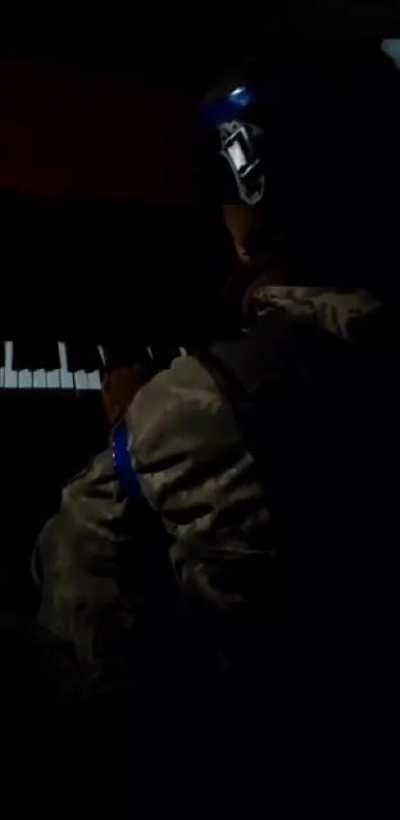 Despite heavy fighting in the city, a Ukrainian Marine plays the piano during a short break. Mariupol.