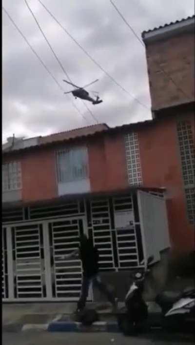 More videos from colombia where helicopters are shooting at protesters