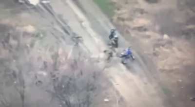 Two Russian soldiers planting anti-armor mines are ambushed and killed by Ukrainian rifle fire and an FPV drone