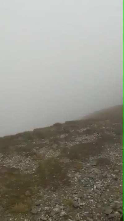 Taking a photo in heavy fucking wind...