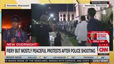 Imagine being this based demrat, LITERAL BURNING CARS BEHIND YOUR SHOOT! Peaceful...