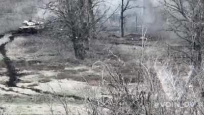 RU pov: Unique footage of a RU tank and an UA soldier with a shoulder fired missile. The UA soldier looks to be standing less than 15 meters from the tank. The RU tank shoots in the direction of the UA soldier.