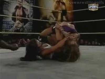Audrey Marie putting AJ in a Bow and Arrow