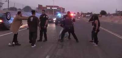 Woman attacks camera man at the scene of the accident…