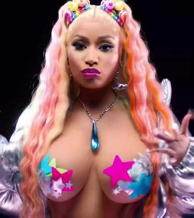 Nicki Minaj teasing her boobs