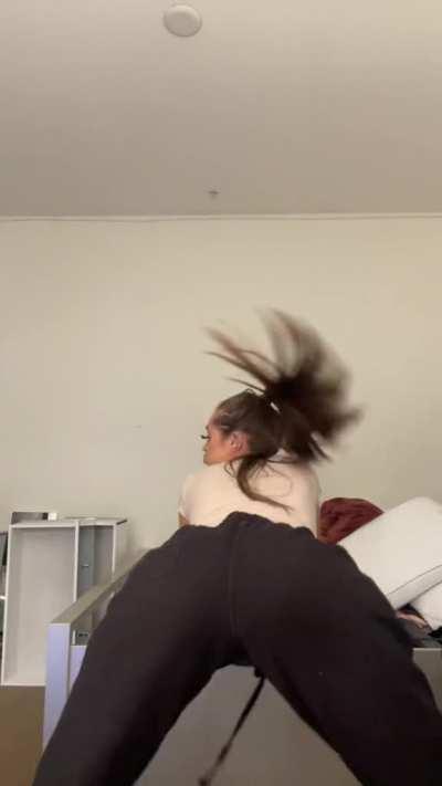 Twerking in black sweatspants