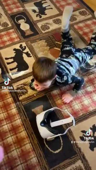 Kid thinks he's on a skyscraper with a parachute while in VR