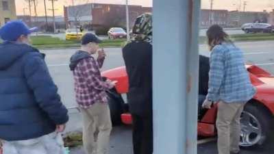 Boomer in sports car has mid-life crisis..... before and during the video.