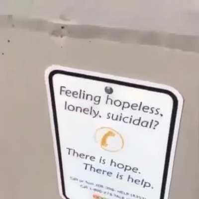 This sign next to a place with frequent suicides