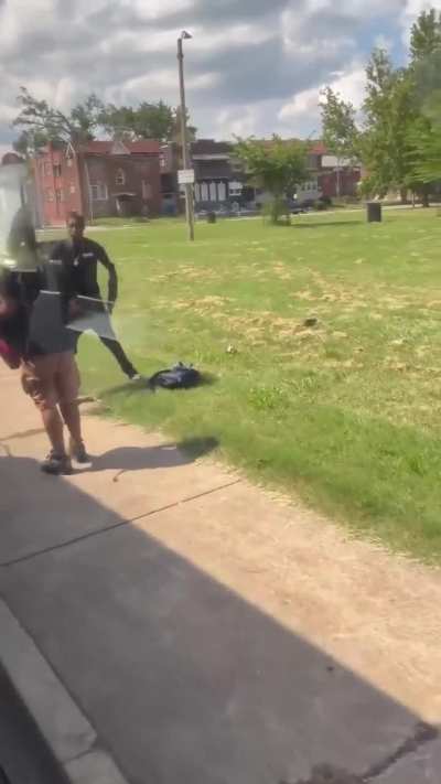 Young man threatens another young man with a gun on a metro bus