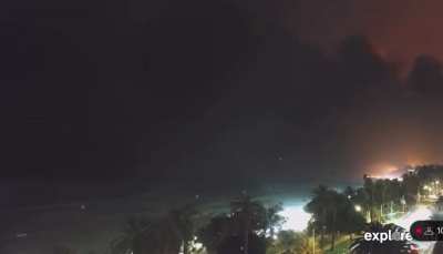 UFO seen flying off the ocean towards Los Angeles fires on beach cam