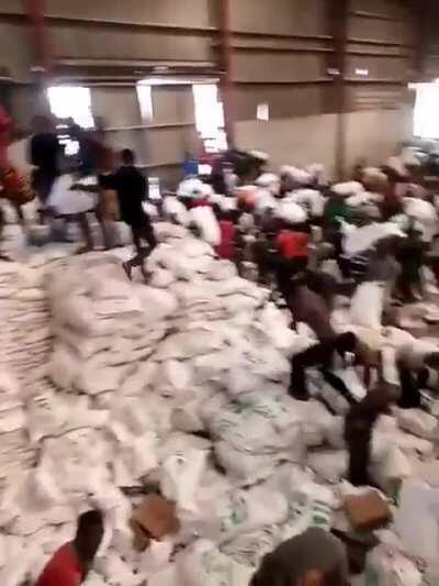A warehouse full of hoarded covid relief items and palliatives discovered by Nigerian citizens in festac Lagos.