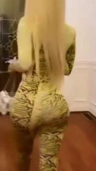 Not even these clothes can contain the booty jiggles on an ass that fat!