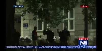 Belgrade, Serbia: police brutality needs to end. Police attack peaceful men sitting in a park