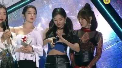 Seulgi trying to make a heart