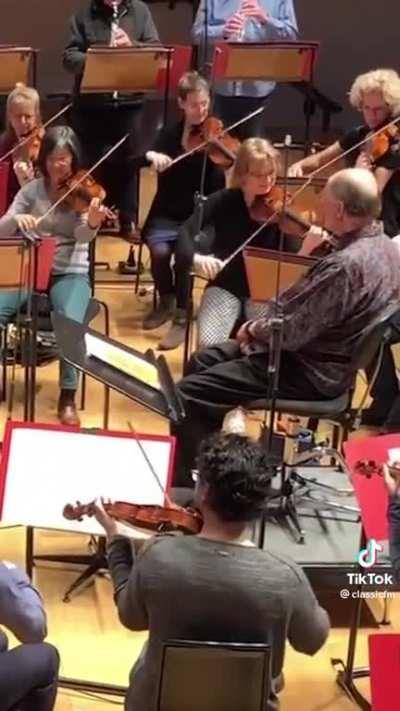 Orchestra pranks their conductor with a beautiful arrangement of 