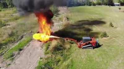 World's first skid loader with a flamethrower attachment