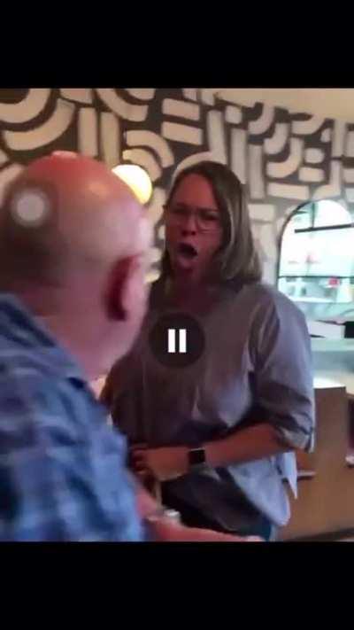 Woman coughs on another person just because she was told to move to another table due to covid-19 restrictions