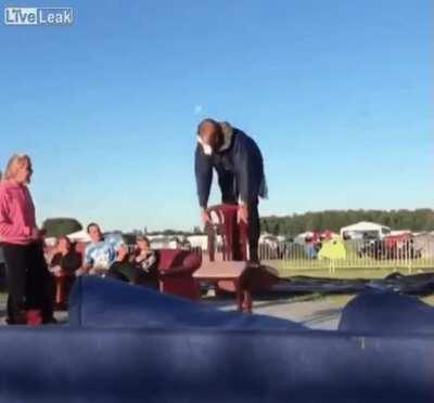 Hitting the table you're standing on with a chair