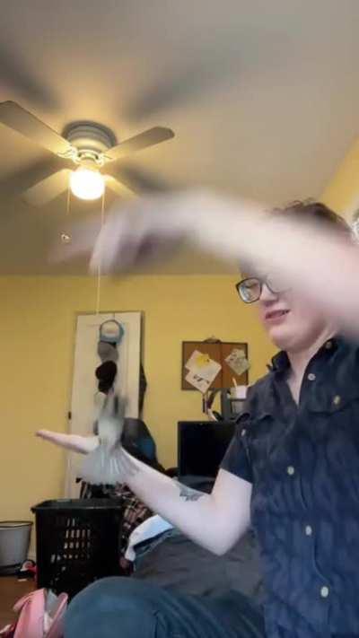 This lady conducting her bird through the air