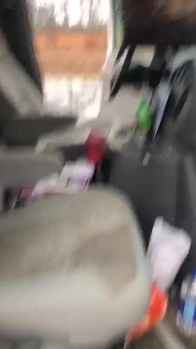 Aftermath of tree trunk hitting windshield.