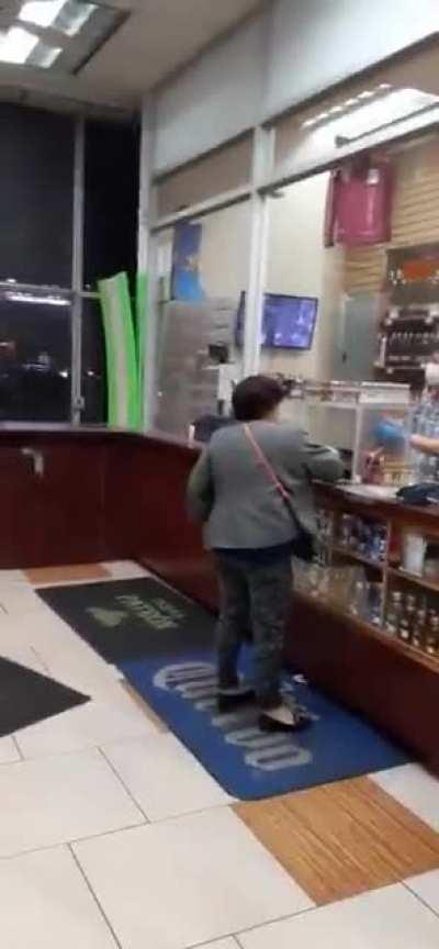 a couple of fiery Latinas in an altercation with a drunk lady