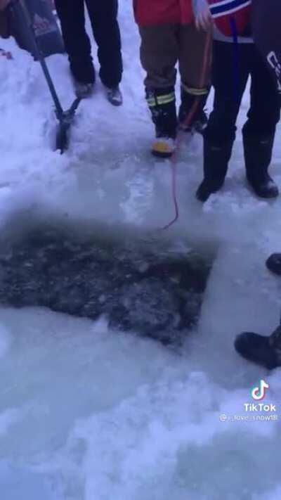 WCGR looking for phone in a frozen lake.