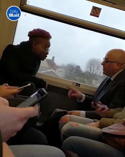 Karen uses a passenger's seat as foot rest and when he complains she starts verbally abusing him