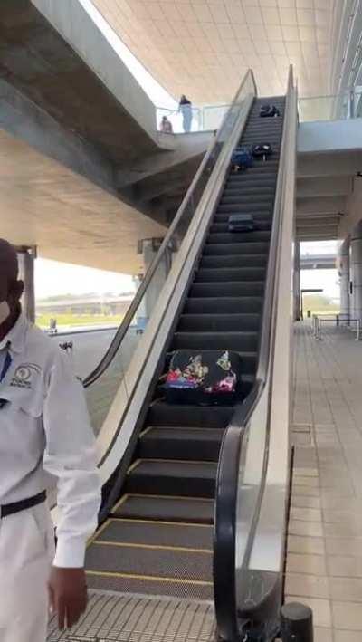 WCGW using Suitcase vs Escalator belt?