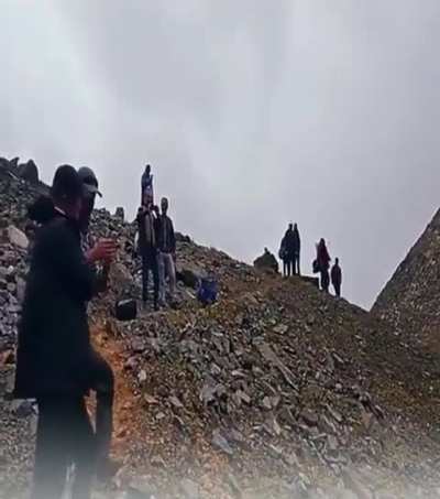 Pushing boulder with buddies