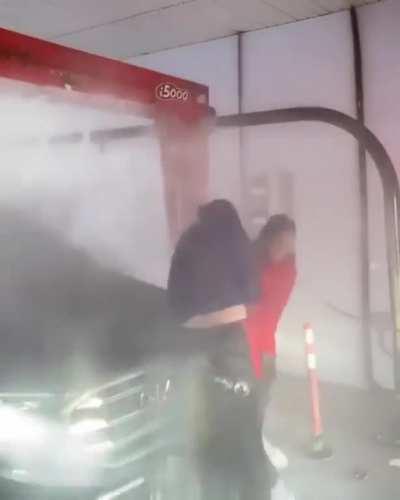 Girls in car washing