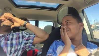 teaching his son how to drive