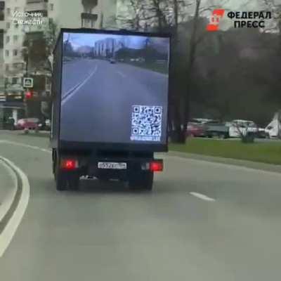 Dashcam video projected to the back of the truck for ease of overtaking