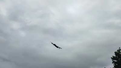 Lancaster Bomber over an old WW2 airfield today in the UK