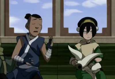 Noticed this cute detail: Toph protecting Momo's ears from getting hit by Sokka's flailing arms