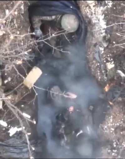 Grenade dropped from drone explodes right next to orc who seems to be quite unimpressed.