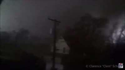 Man records tornado as it destroys his house and entire neighborhood.